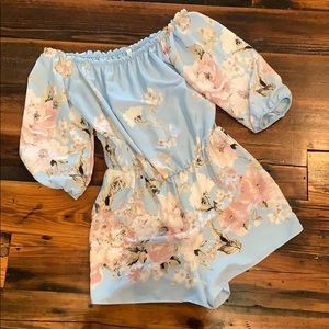 Floral blue romper!! worn once!! size Medium!
